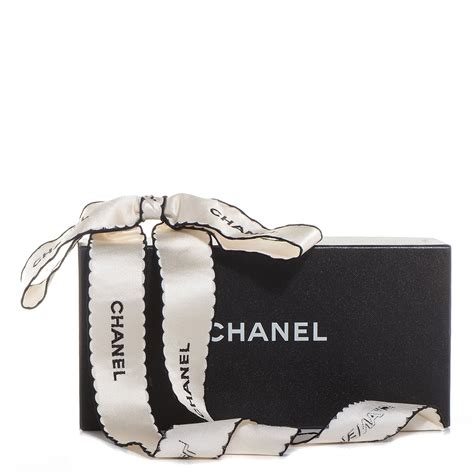 white chanel ribbon|chanel ribbon brooch.